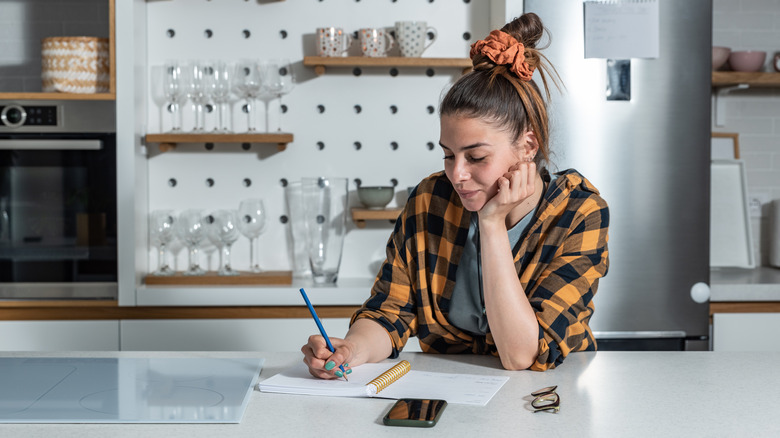 Woman making a list