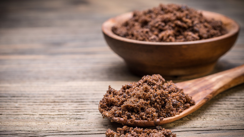 bowl of muscovado sugar on table