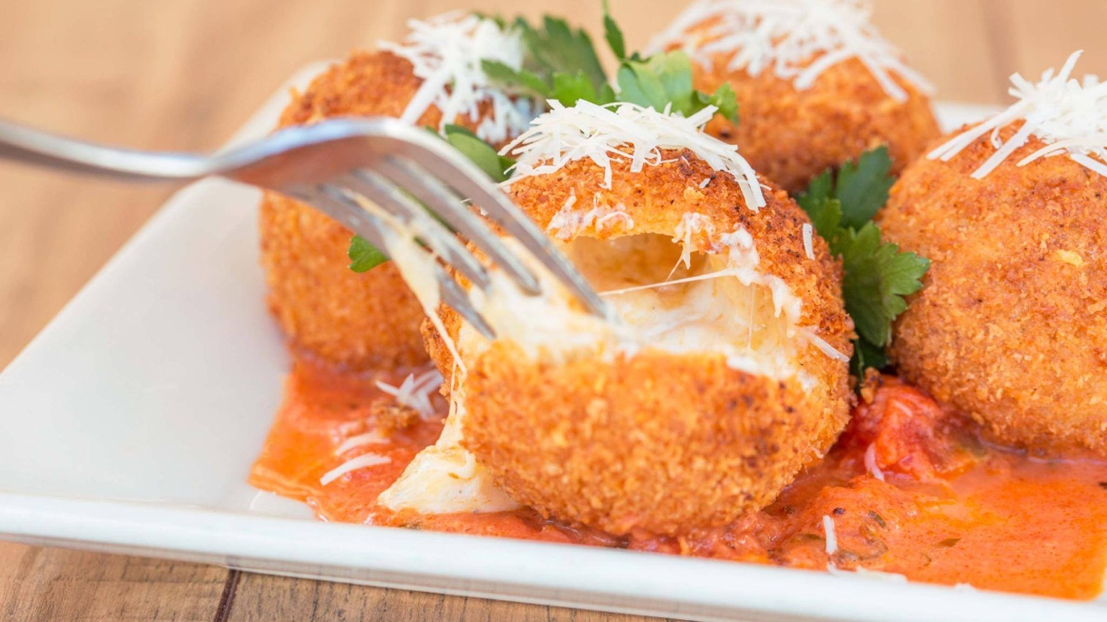 How Alain Ducasse Inspired The Cheesecake Factory's Mac & Cheese Balls