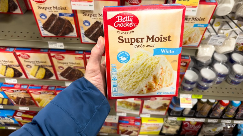 hand holding cake mix box
