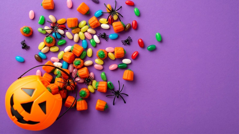 Pumpkin bucket with spilled candy