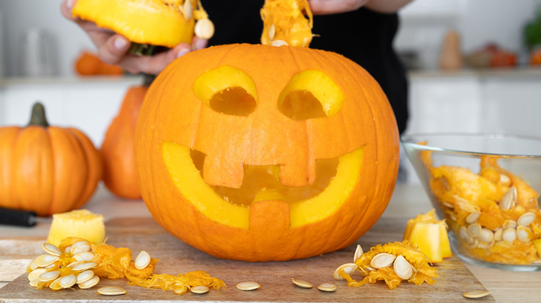 jack-o-lantern being gutted