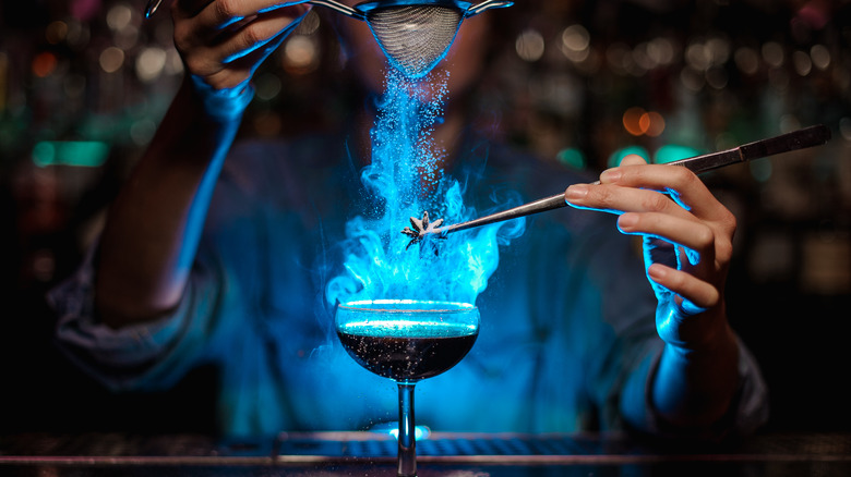 cocktail with large blue flame