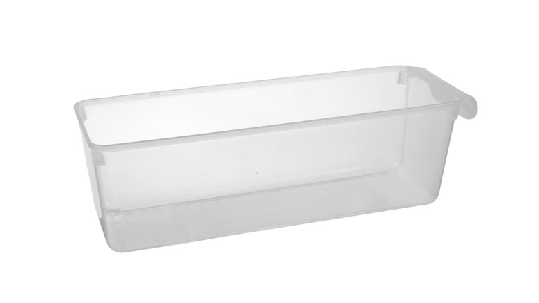 Clear plastic storage container on white background