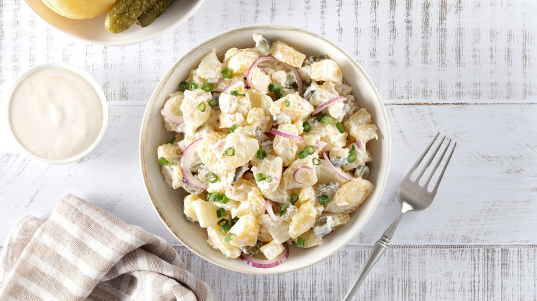 Potato salad with pickled cucumbers and onions