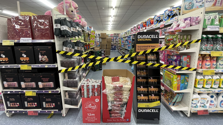 British store blocking a grocery store aisle
