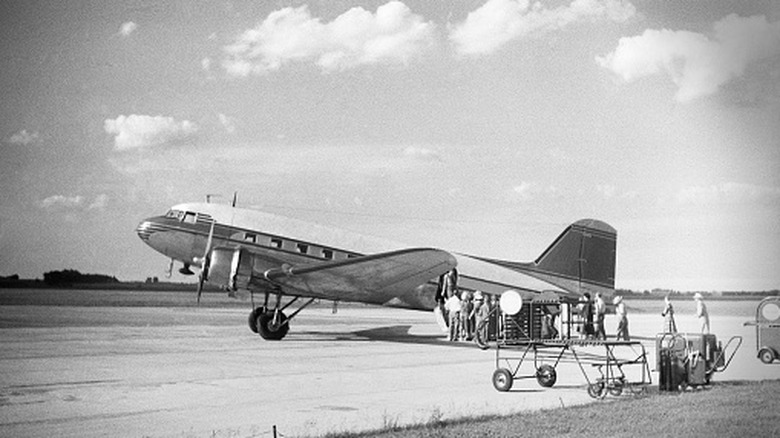 A commercial passenger plane on the tarmac in 1951