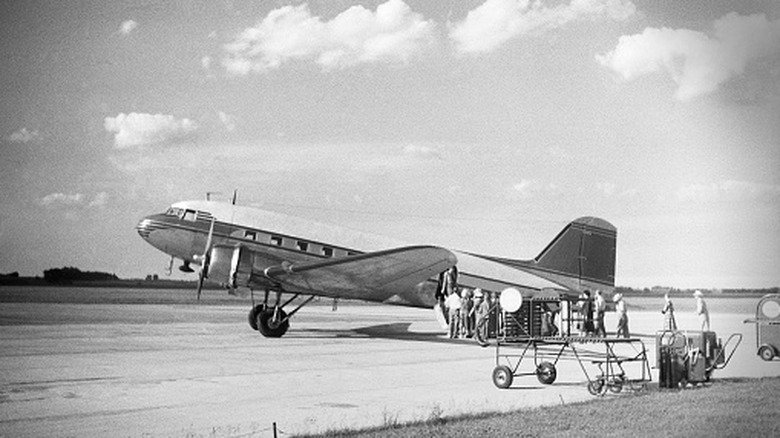A commercial passenger plane on the tarmac in 1951