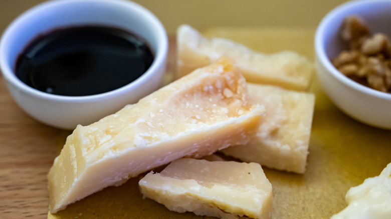 Rustic pieces of Parmesan and vinegar