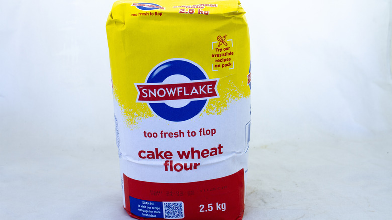 A yellow, red, white and blue bag of snowflake cake flour
