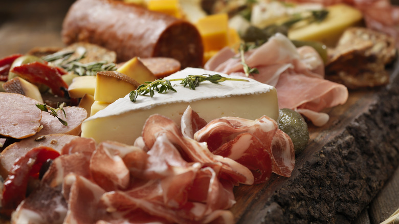 Cured meat on charcuterie board