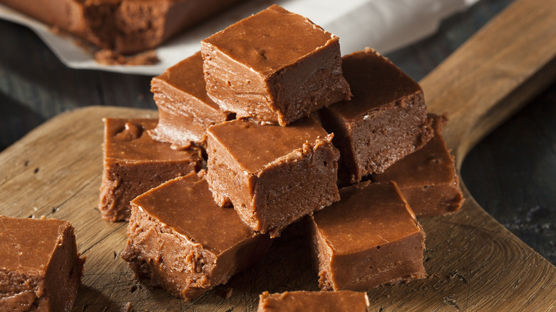 fudge cubes on wooden board
