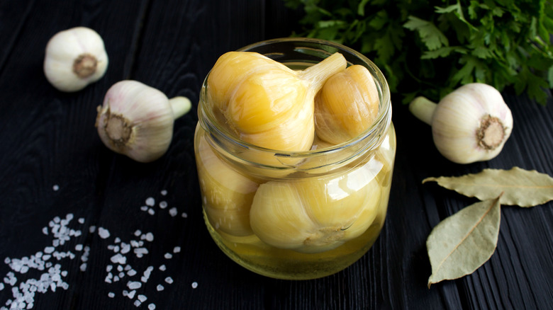 Pickled garlic in jar