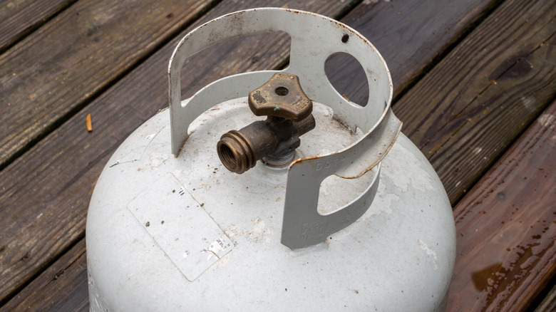 Propane tank for a grill on a deck