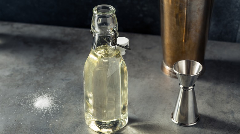 simple syrup in glass bottle