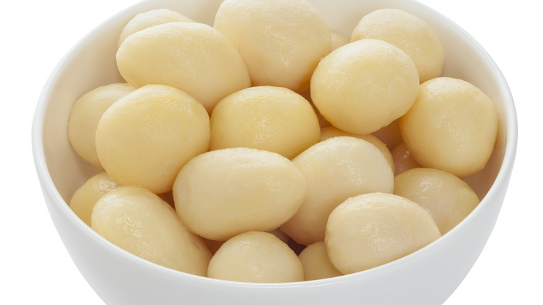 Canned potatoes in white bowl