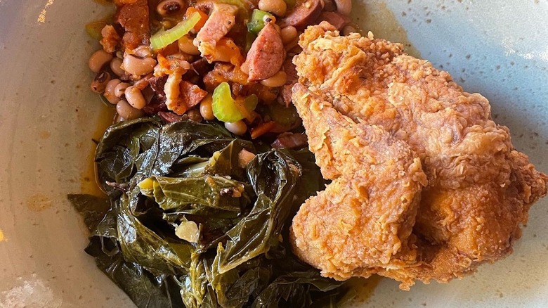 Fried chicken with black-eyed peas and collard greens from Melba's
