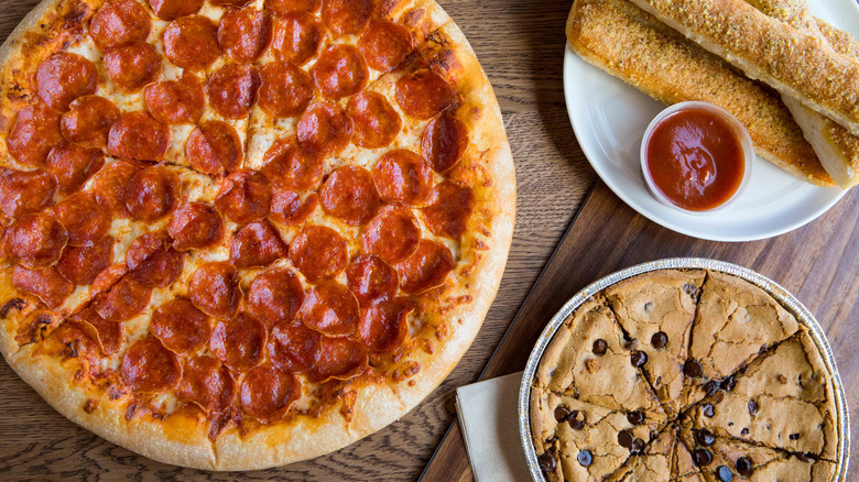 How Pizza Hut's Hand-Tossed Crust Is Changing In 2026