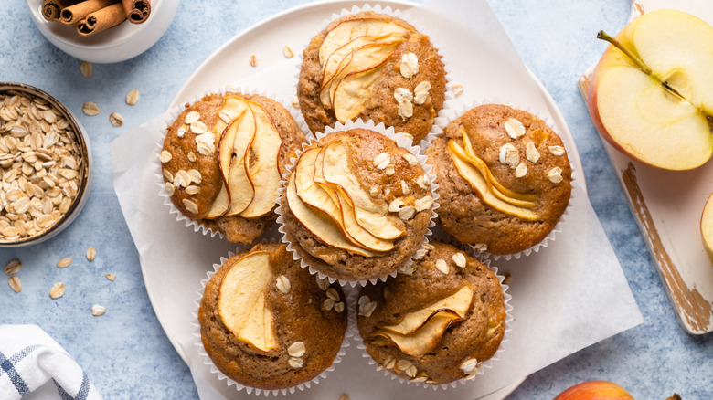 Apple muffins stacked on plate