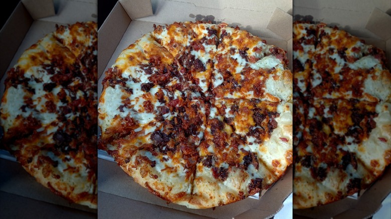 Domino's viral phillycheesesteak pizza in pizza box