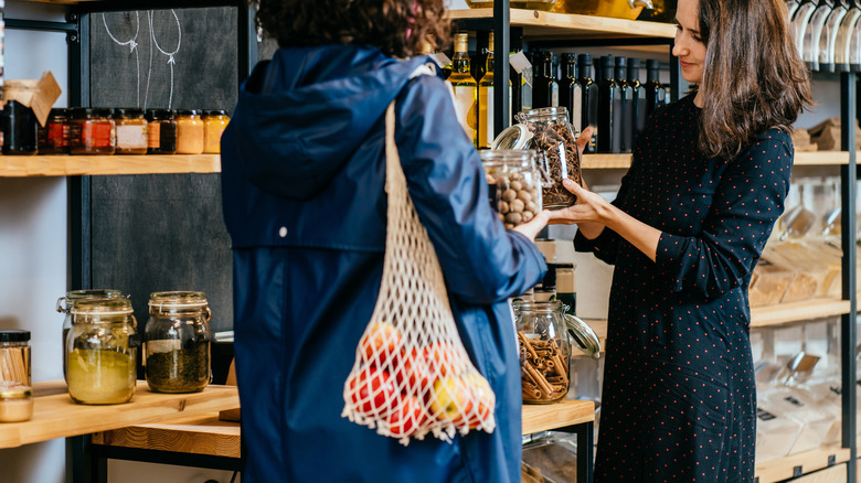 Two women in food store
