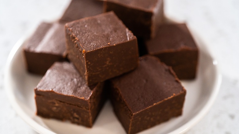chocolate fudge cubes on a small plate