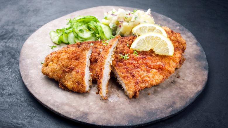 Schnitzel with potato and cucumber salad
