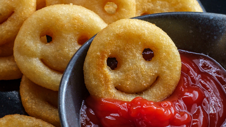 smiley fry being dipped 