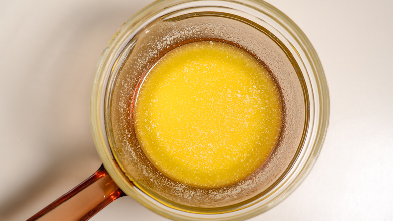 Melted butter in glass bowl