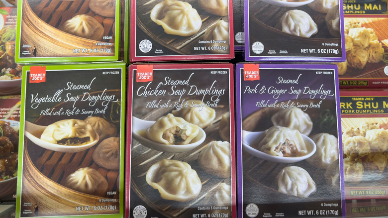 boxes of Trader Joe's dumplings in freezer case
