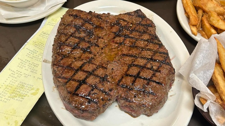 Custom 40-ounce sirloin on plate at Texas Roadhouse