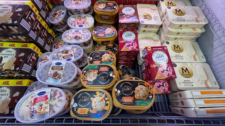 Various tubs of ice cream in chiller
