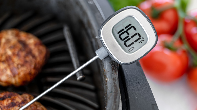 meat thermometer on a grill