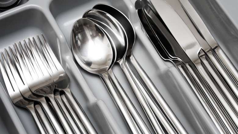 silverware in utensil tray