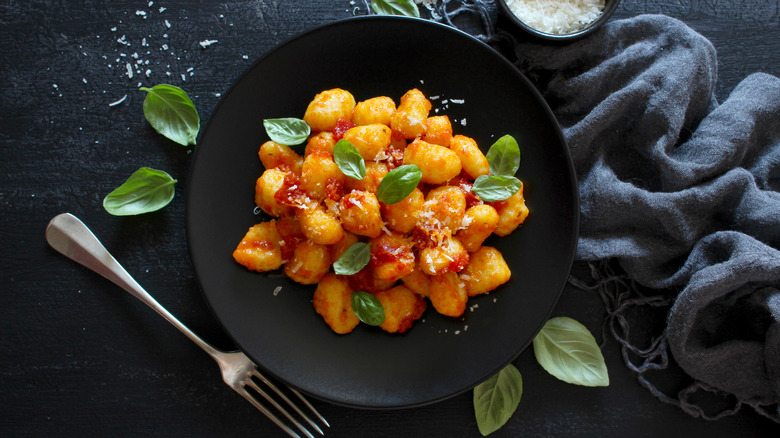 Fresh potato gnocchi with basil