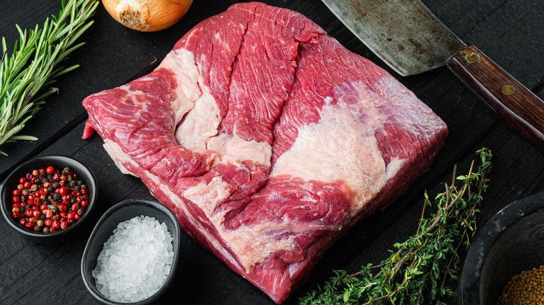 raw beef brisket and spices