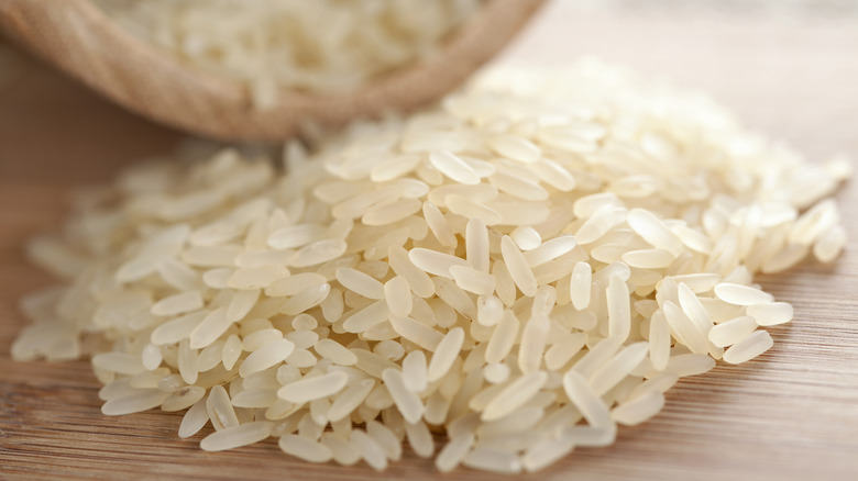 Uncooked rice grains from bowl