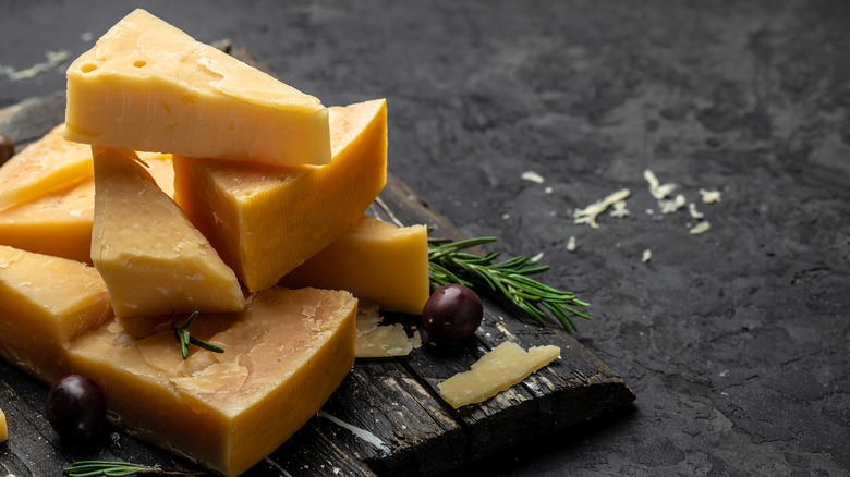Parmesan cheese against dark background