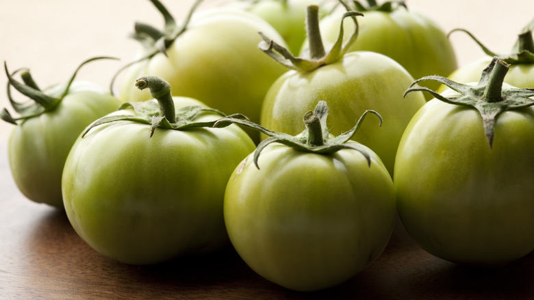 group of green tomatoes close up