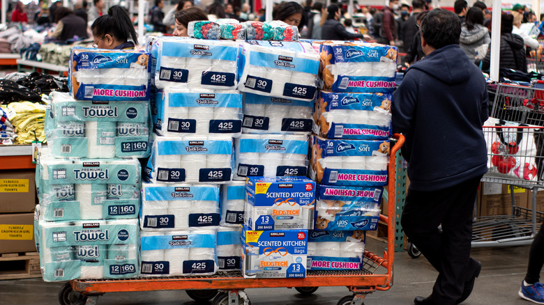 Costco shopper with toilet paper