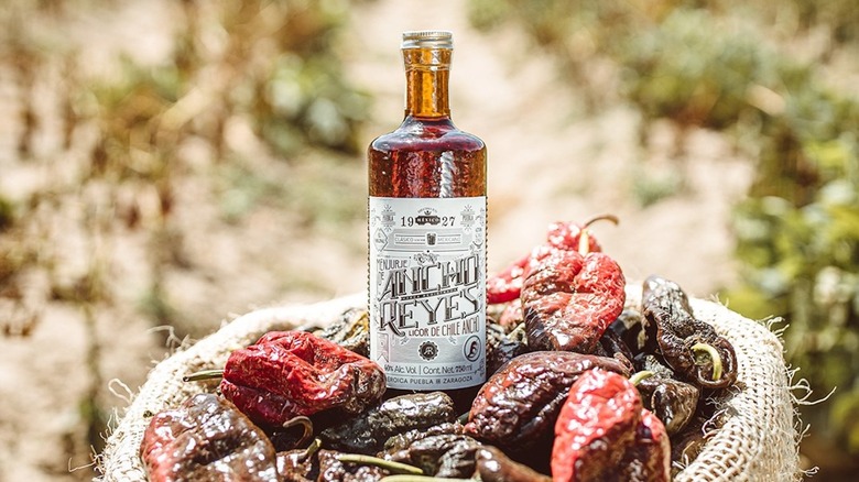 Ancho Reyes liqueur with peppers
