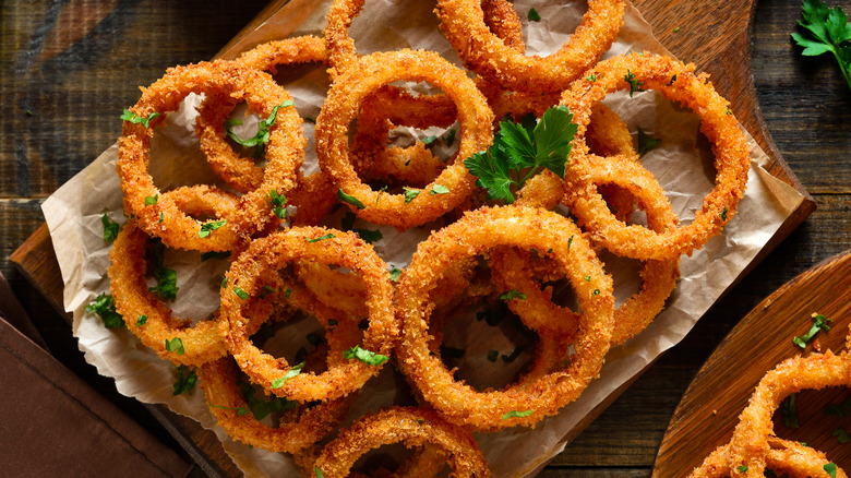 Overhead view of a tray of homemade onion rings