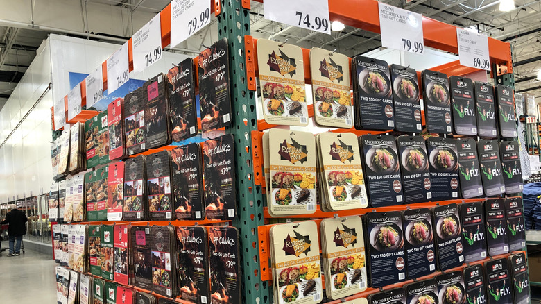 Gift card display at Costco with prices