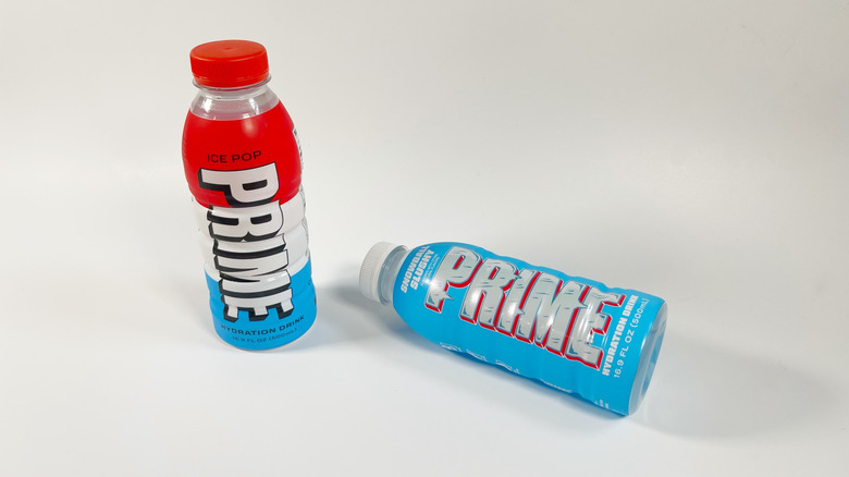 Two bottles of PRIME on a white background