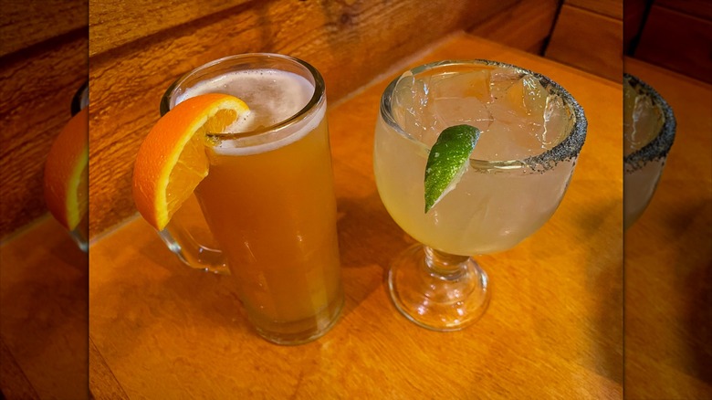 beer and margarita on table