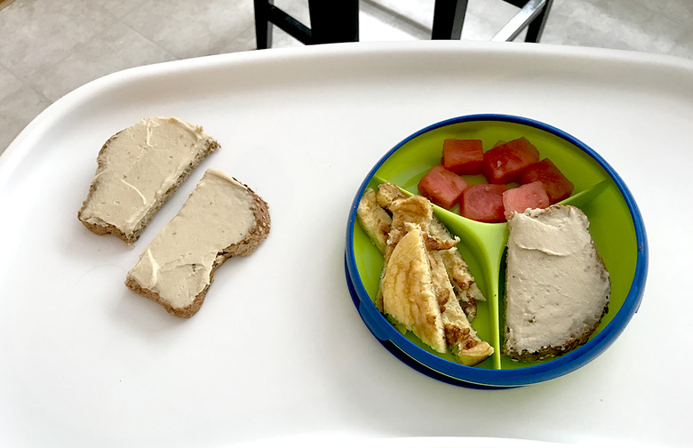 Toast With Hummus, Scrambled Eggs, and Watermelon