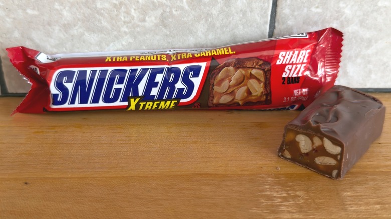 Xtreme Snickers bar with piece cut in half