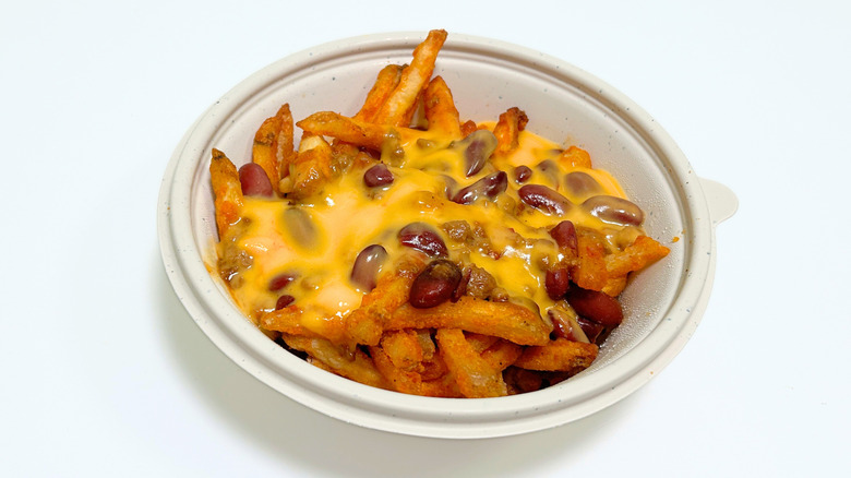 Close up of Wawa Chili Cheese Fries in a to-go container