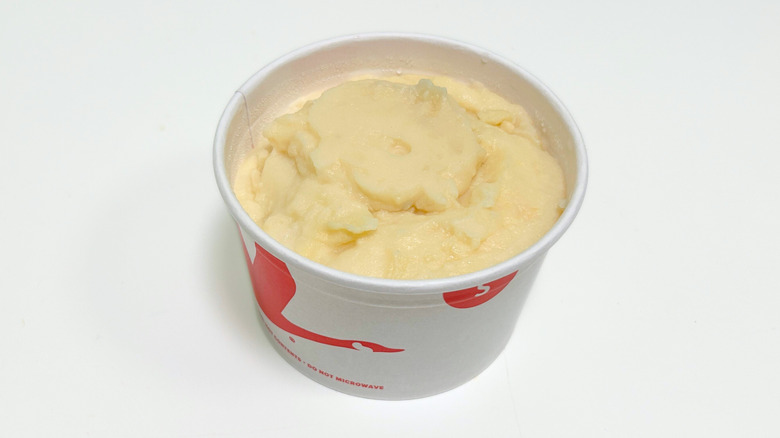 Close up of Wawa Mashed Potatoes in a to-go container