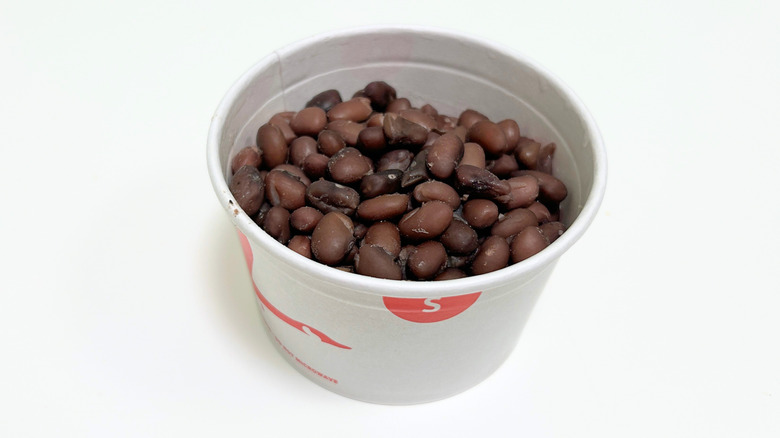 A to-go container of Wawa Seasoned Black Beans up close